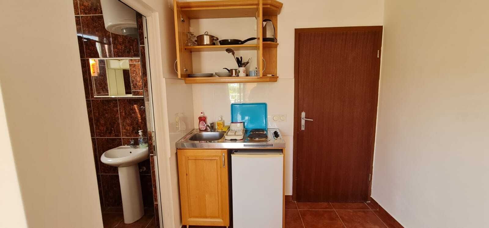 Fridge, stovetop, electric kettle, cookware/dishes/utensils