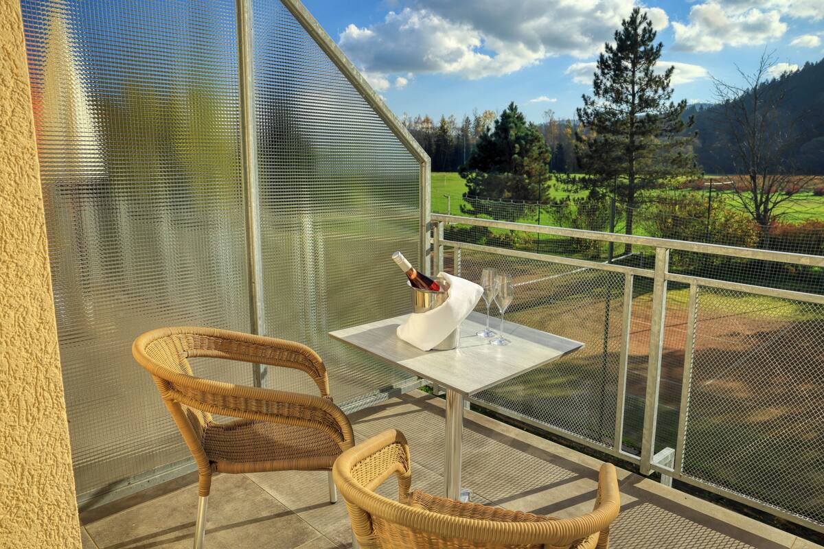 Suite, Balcony | In-room safe, desk, free WiFi, bed sheets