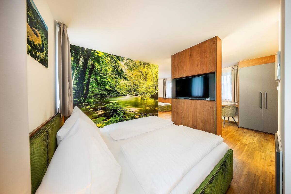 Luxury Quadruple Room | In-room safe, desk, free WiFi, bed sheets