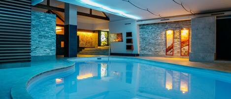 Indoor pool, seasonal outdoor pool, pool umbrellas, sun loungers