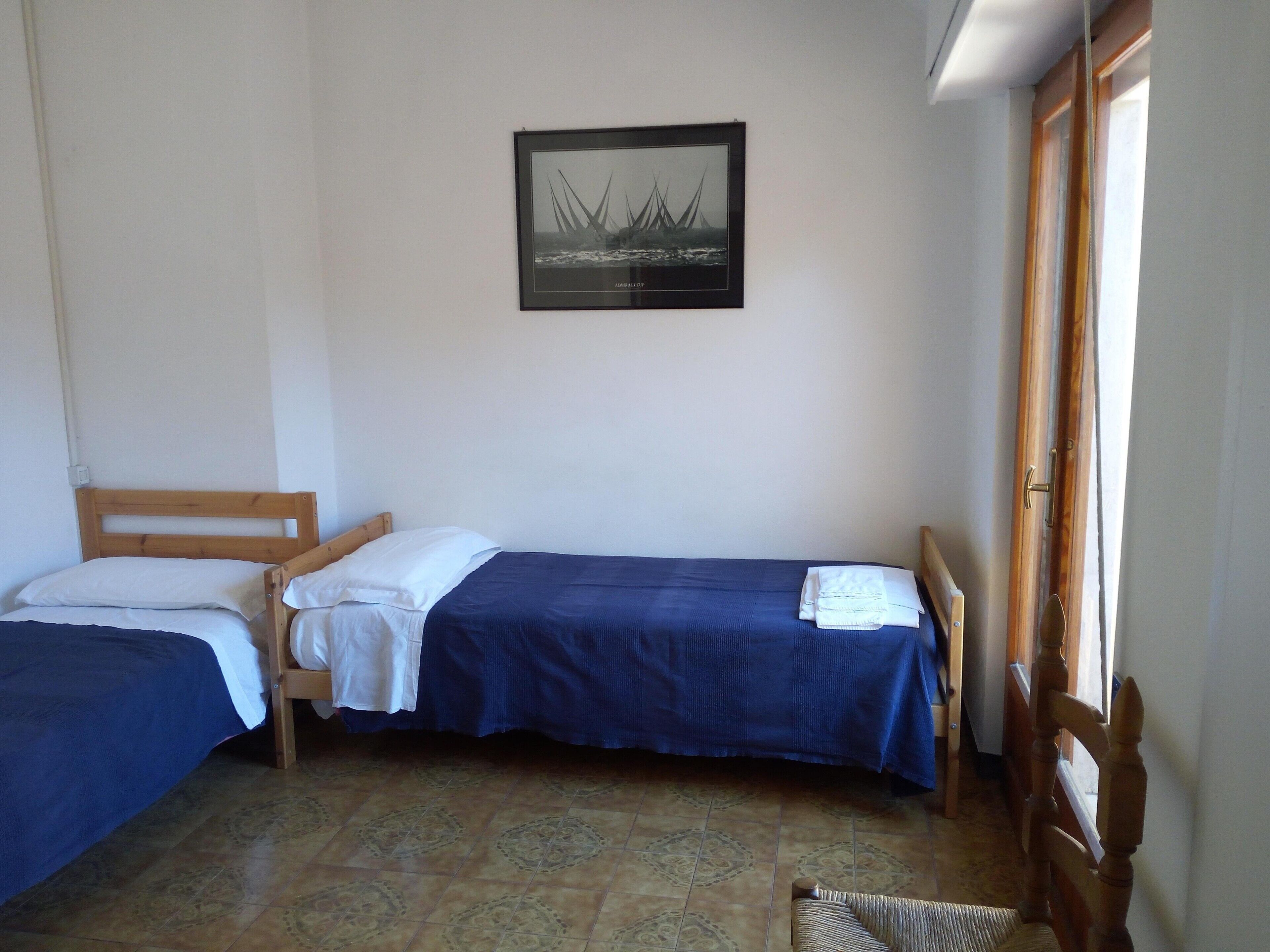 2 chambres, fer et planche à repasser, Wi-Fi, draps fournis
