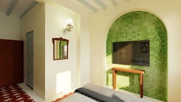 A bedroom with a bed, a mirror, a wall-mounted TV, and a green textured wall.
