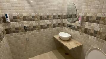 Shower, towels, soap, shampoo
