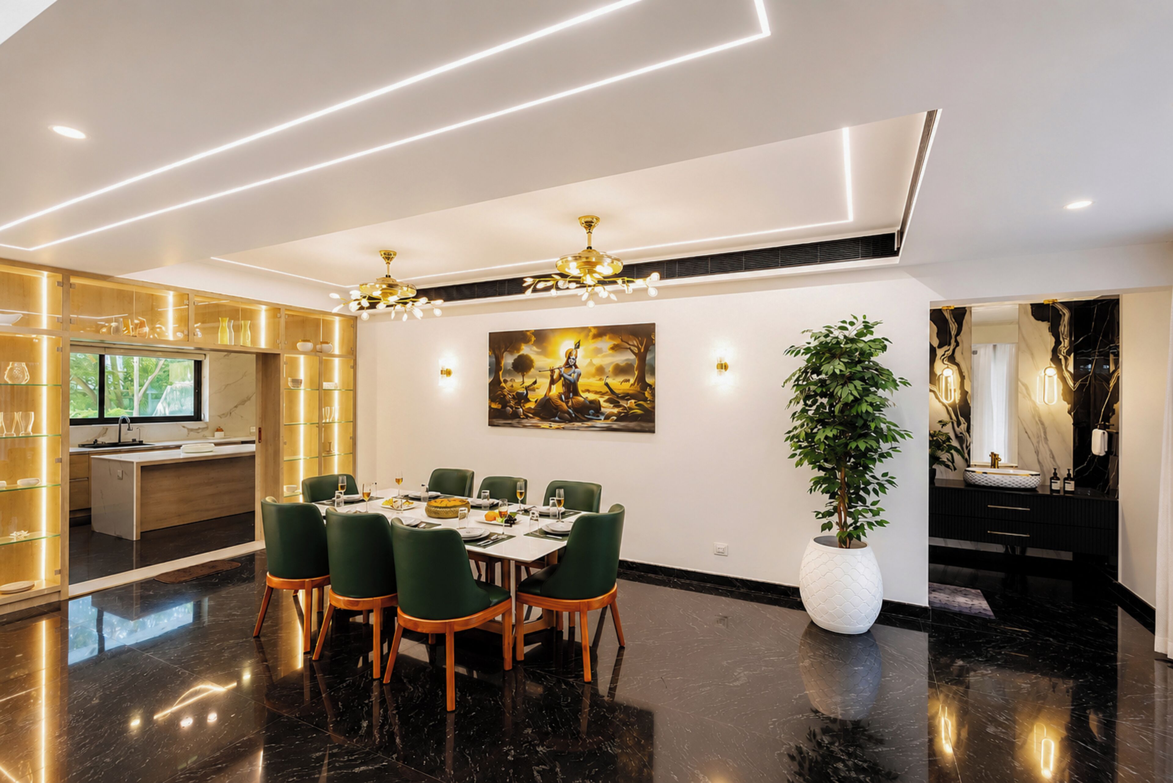 A modern dining area with a table set for six, green chairs, a large potted plant, and a painting on the wall.