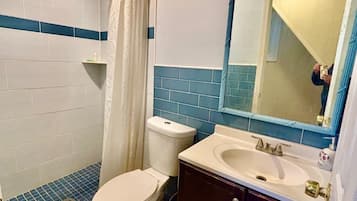 Shower, towels, soap, toilet paper