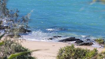 On the beach, sun loungers, beach towels