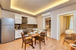 Deluxe Apartment, Park View | Private kitchen | Oven, dishwasher, cookware/dishes/utensils, cleaning supplies - Port Apart Hotel (Fatih)