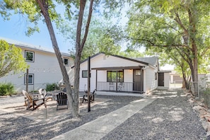A two-story house with a patio area, outdoor seating, and a small deck. - Historic Prescott Gem! Walk to Whiskey Row! (Prescott)