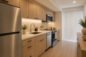 Monolocale Classic | Cucina privata | Frigorifero, microonde, forno, piano cottura