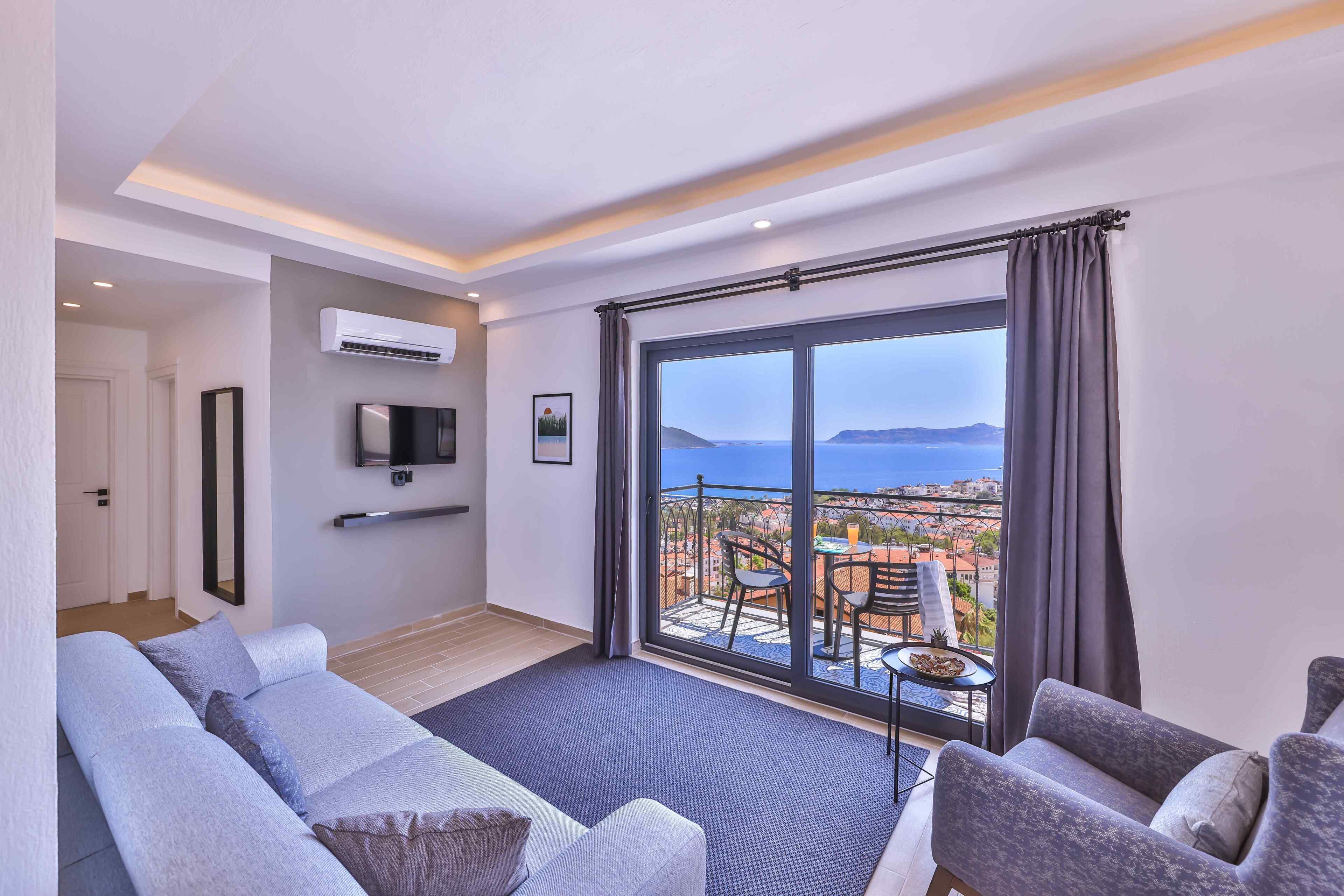 Apartamento básico, balcón, vistas al mar | Zona de estar