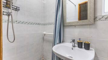 Shower, hair dryer, shampoo