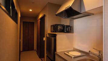 Comfort Condo, Multiple Beds | Private kitchen | Fridge, coffee/tea maker, electric kettle, toaster