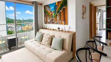 Deluxe Apartment, 3 Bedrooms, Partial Sea View | Living area