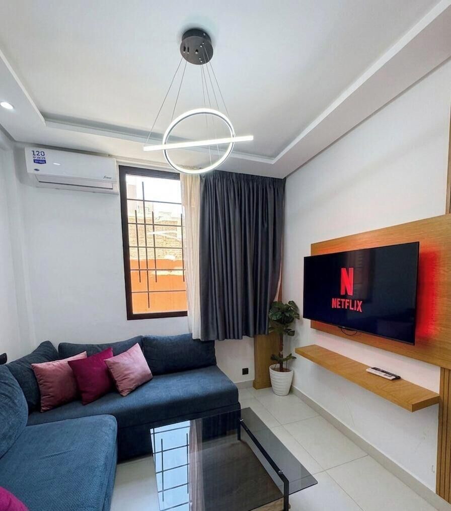 Deluxe Studio, City View | Living area | 45-inch Smart TV with digital channels