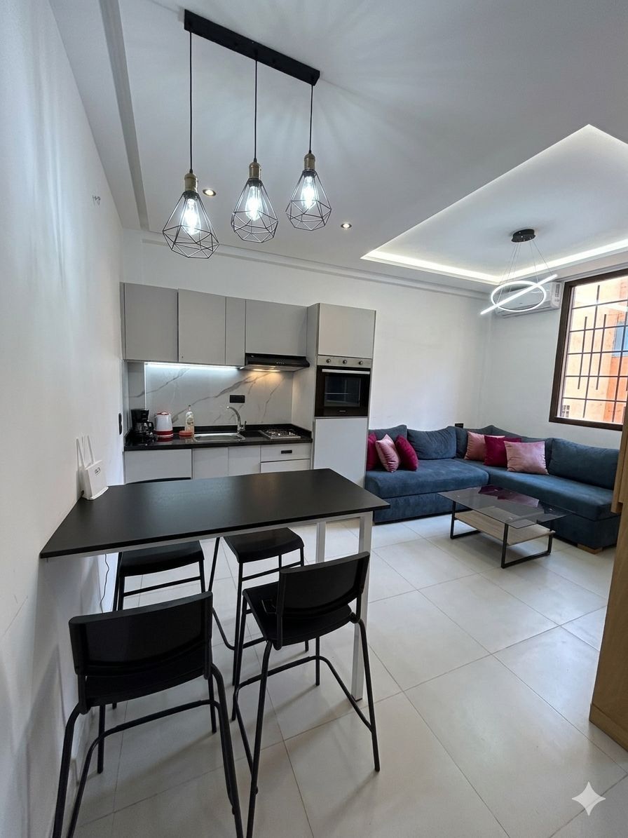Deluxe Studio, City View | Living area | 45-inch Smart TV with digital channels