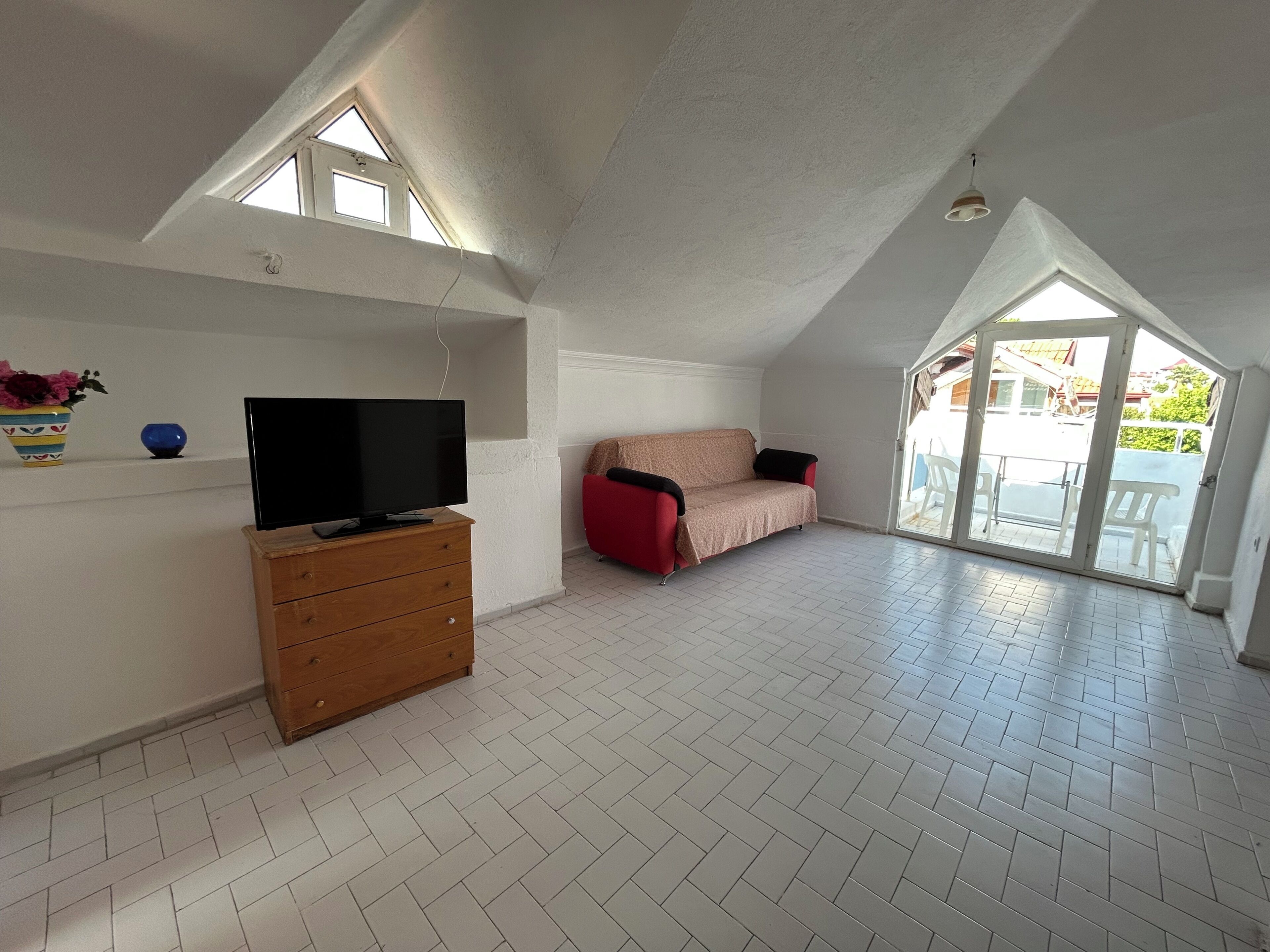 Loft, sacada, vista para a cidade | Área de estar