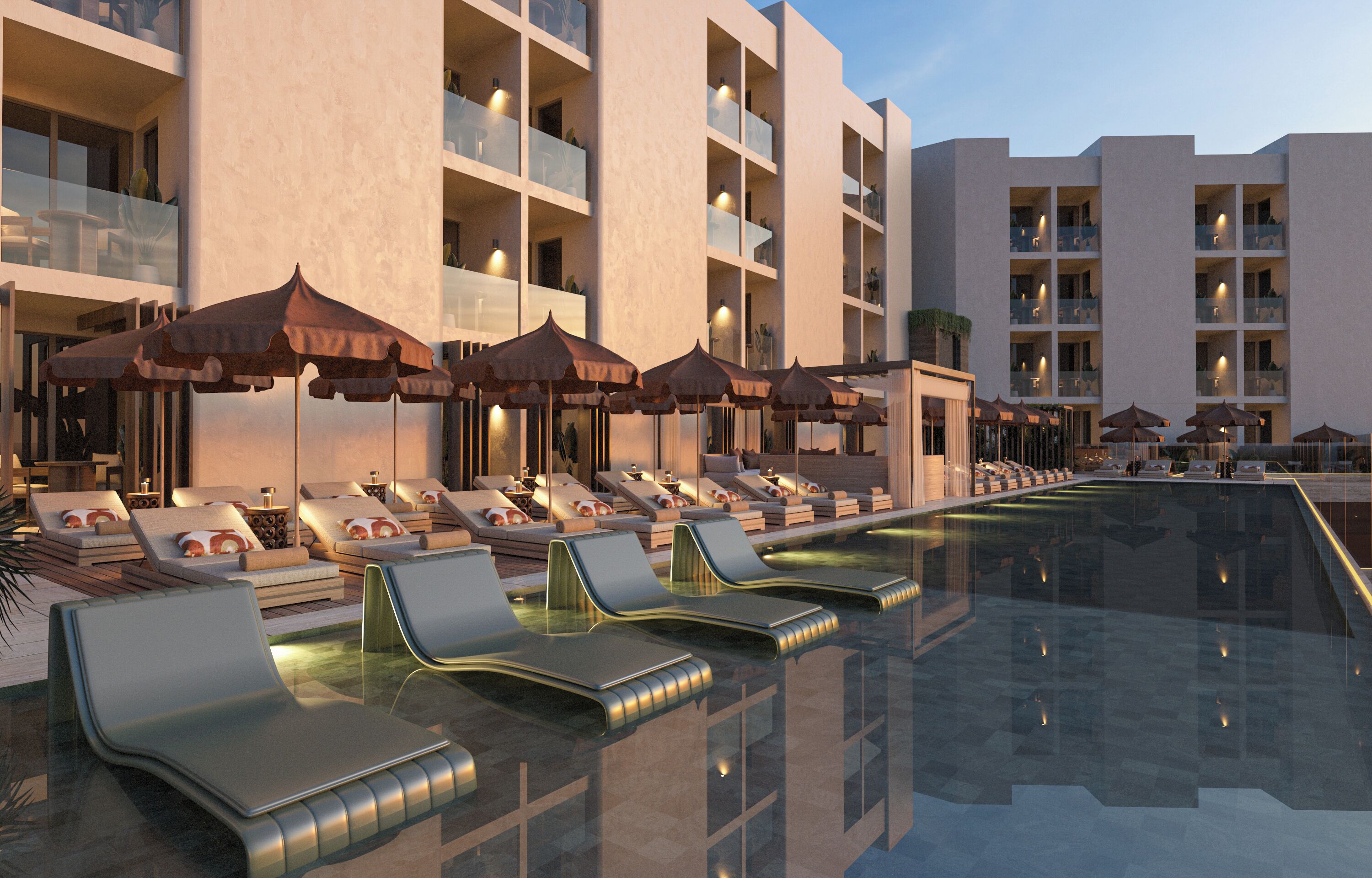 A modern hotel with a pool area featuring sun loungers and umbrellas.