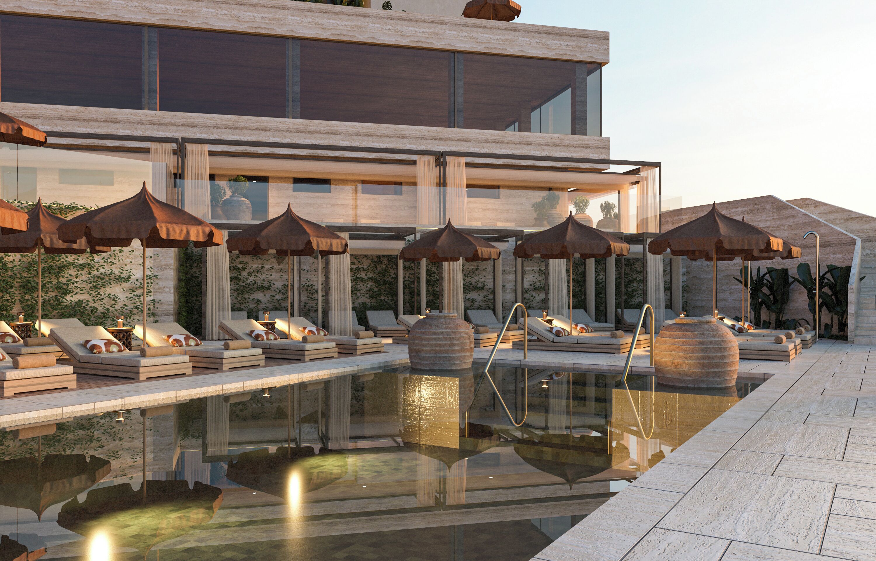 A modern pool area with lounge chairs and umbrellas, reflecting the building's architecture.