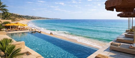 2 outdoor pools, pool umbrellas, sun loungers