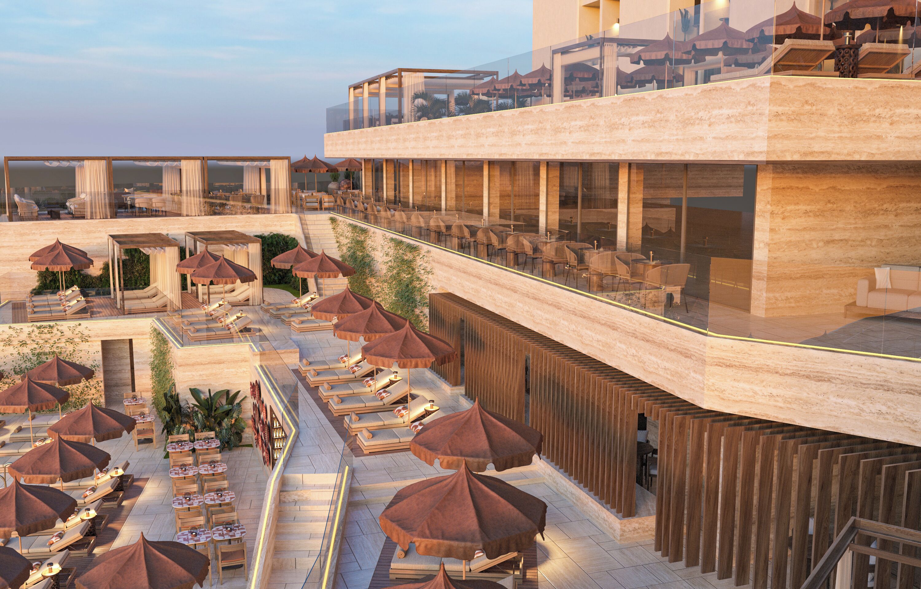 Un bar situé sur le toit, avec une terrasse et des parasols.