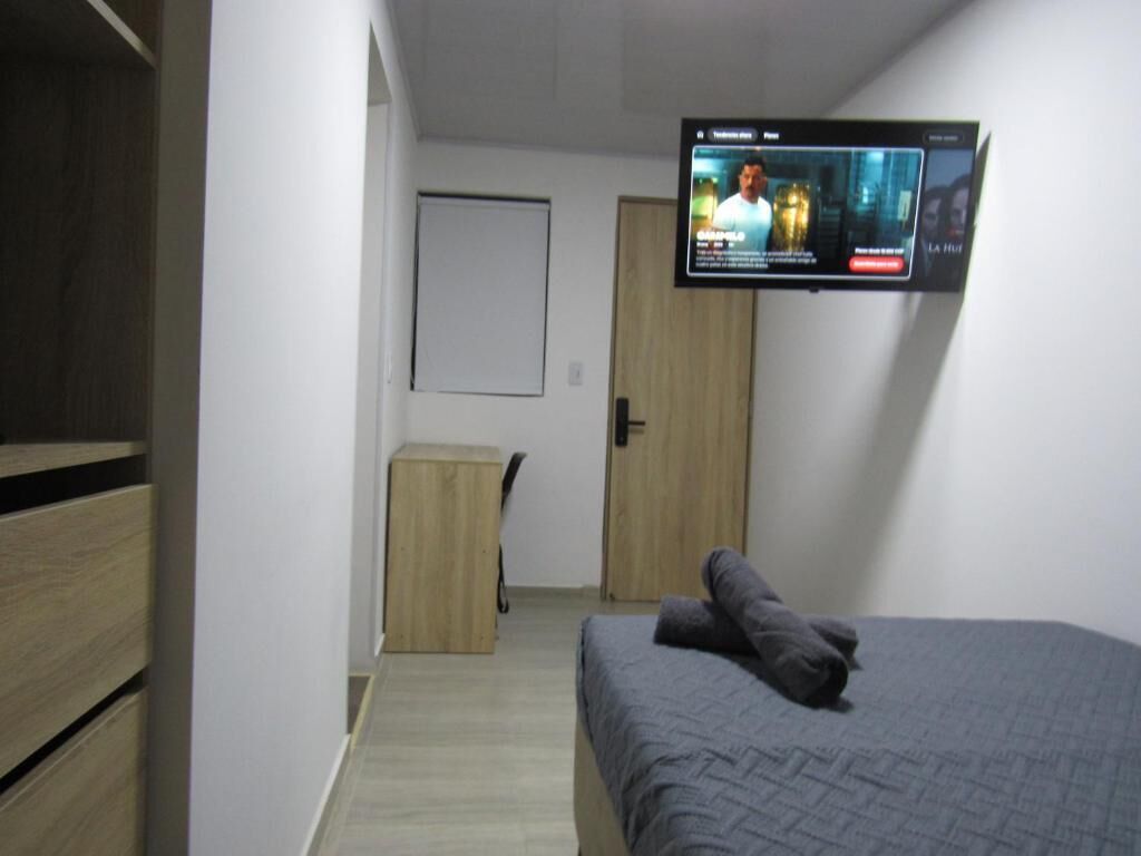 Quarto casal | Cortinas blackout, ferros/tábuas de passar roupa, Wi-Fi de cortesia