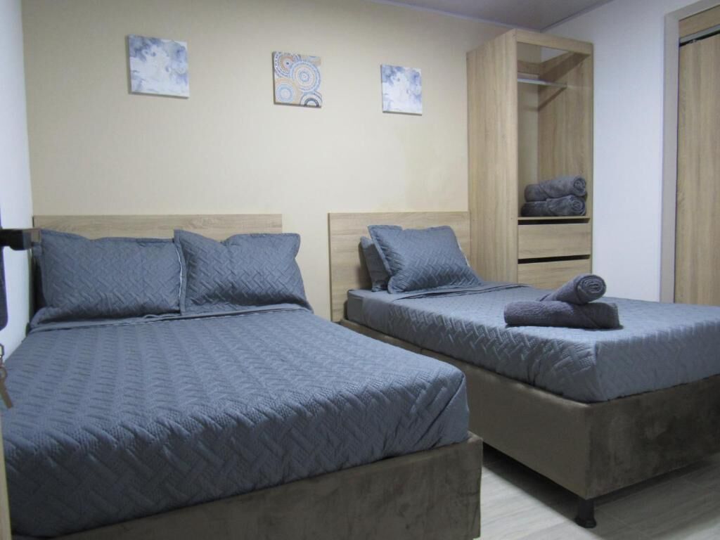 Quarto família | Cortinas blackout, ferros/tábuas de passar roupa, Wi-Fi de cortesia