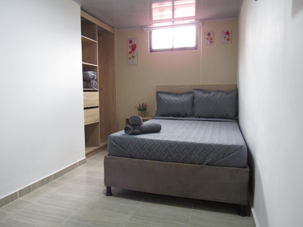 Quarto casal | Cortinas blackout, ferros/tábuas de passar roupa, Wi-Fi de cortesia