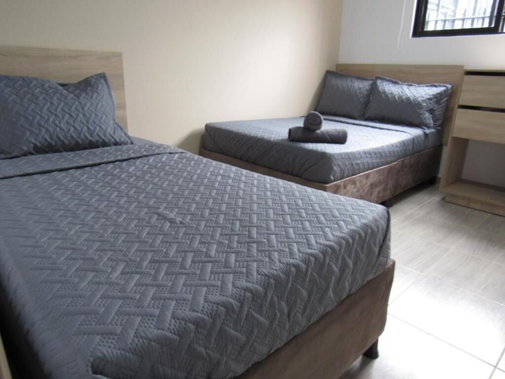 Quarto família | Cortinas blackout, ferros/tábuas de passar roupa, Wi-Fi de cortesia