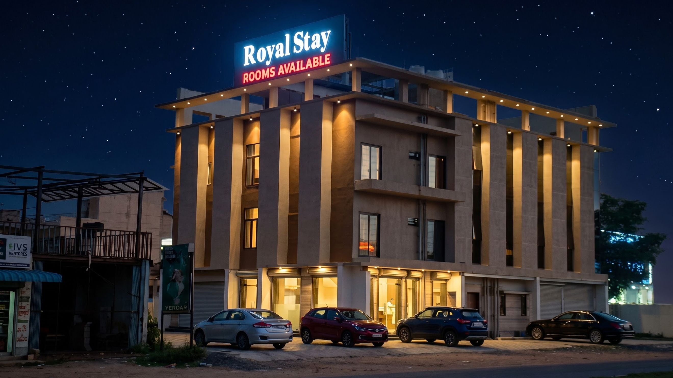 Un hotel llamado 'Royal Stay' con un cartel que indica que hay habitaciones disponibles.