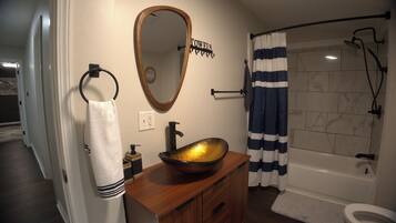 Hair dryer, towels, soap, toilet paper