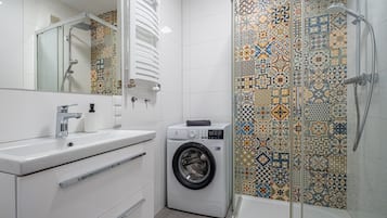 Hair dryer, towels, soap, shampoo