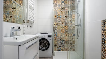 Hair dryer, towels, soap, shampoo