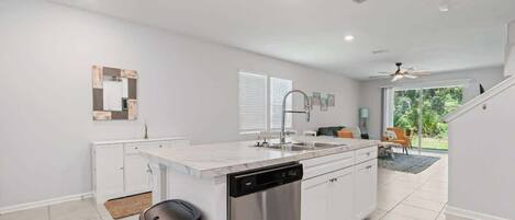 Fridge, coffee/tea maker, cookware/dishes/utensils