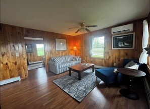 Living area - Cozy cabin on a homestead surrounded by animals - enjoy a fire pit & fresh eggs (Independence)