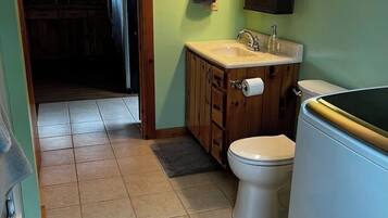 Shower, towels, soap, toilet paper