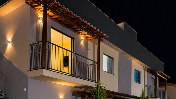 A modern two-story house with a balcony, a staircase, and a well-lit entrance. - Porto Fino Residential Complex, 5 minutes from the city center. (Porto Seguro)