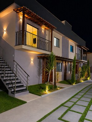 A modern two-story house with a balcony, a staircase, and a well-lit entrance. - Porto Fino Residential Complex, 5 minutes from the city center. (Porto Seguro)