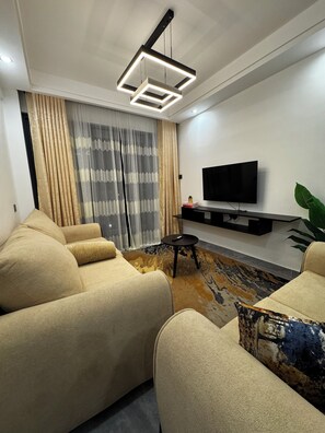 Living area - Cozy 1-bedroom apartment in welcoming Nairobi with fitness room (Nairobi)