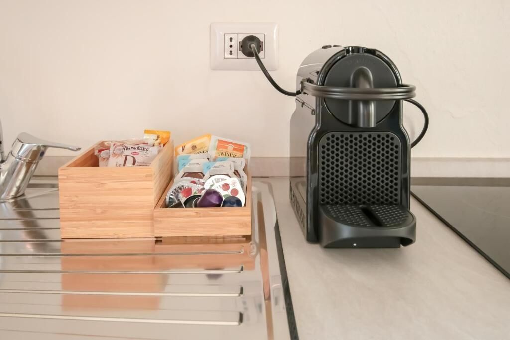 Apartment, Balcony, City View | Coffee and/or coffee maker