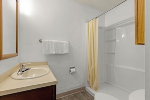 Suite, Multiple Beds | Bathroom