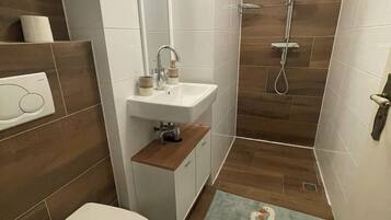 Hair dryer, towels, soap, toilet paper