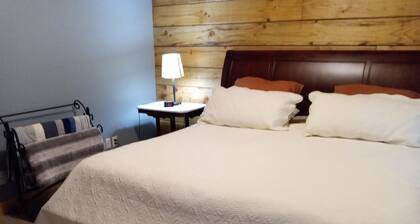 Whispering Waters Chalet: Mountain Loft Living with Hot Tub & Games