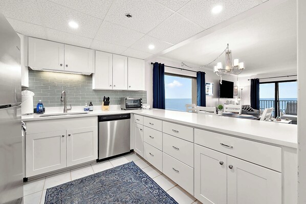 Fridge, microwave, oven, stovetop - Oceanfront Retreat | Pool | Deck | 2 Balconies (Ocean City)