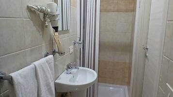 Hair dryer, bidet, towels, soap