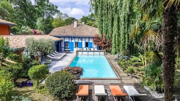 Seasonal outdoor pool, open 10:00 AM to 7:00 PM, sun loungers