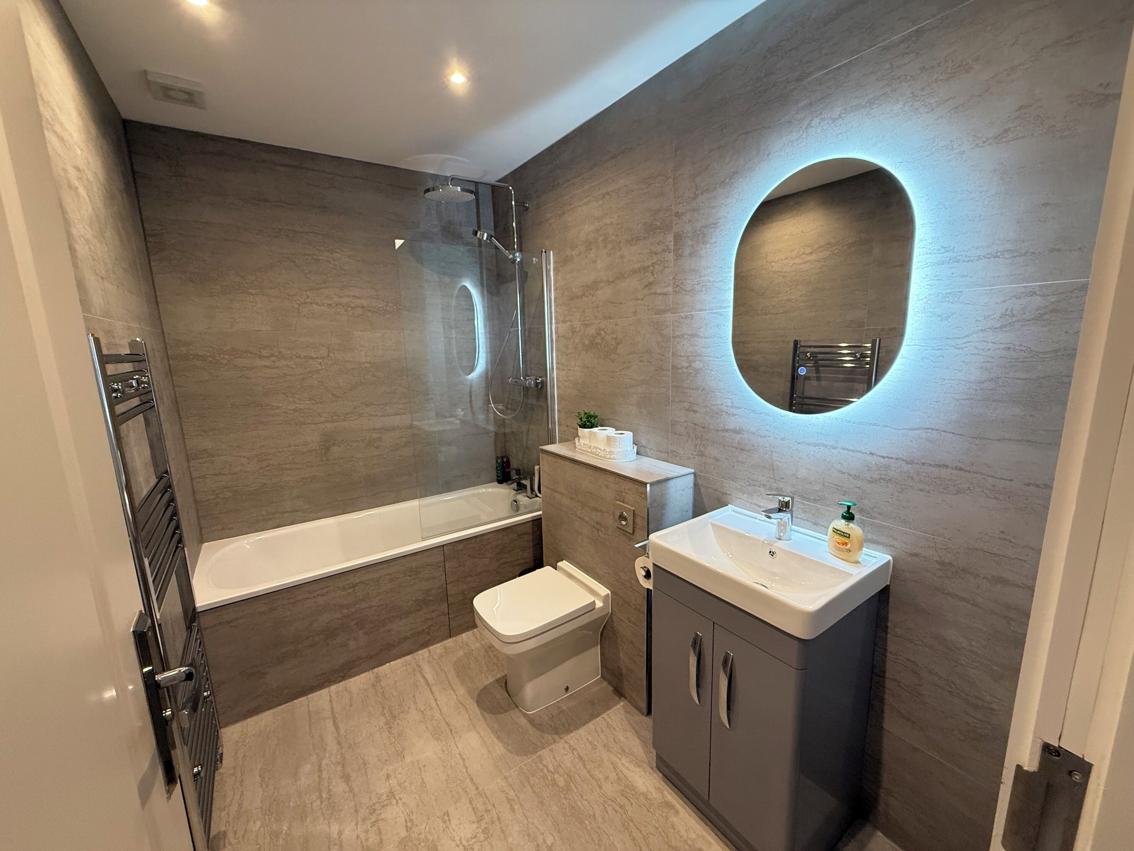 Hair dryer, bidet, towels, soap