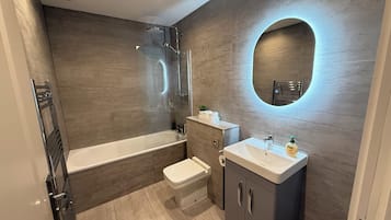 Hair dryer, bidet, towels, soap