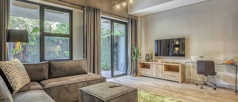 Departamento, 1 habitación, con acceso para personas discapacitadas, patio | Área de sala de estar