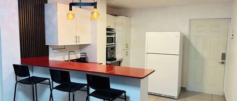 Fridge, microwave, oven, stovetop