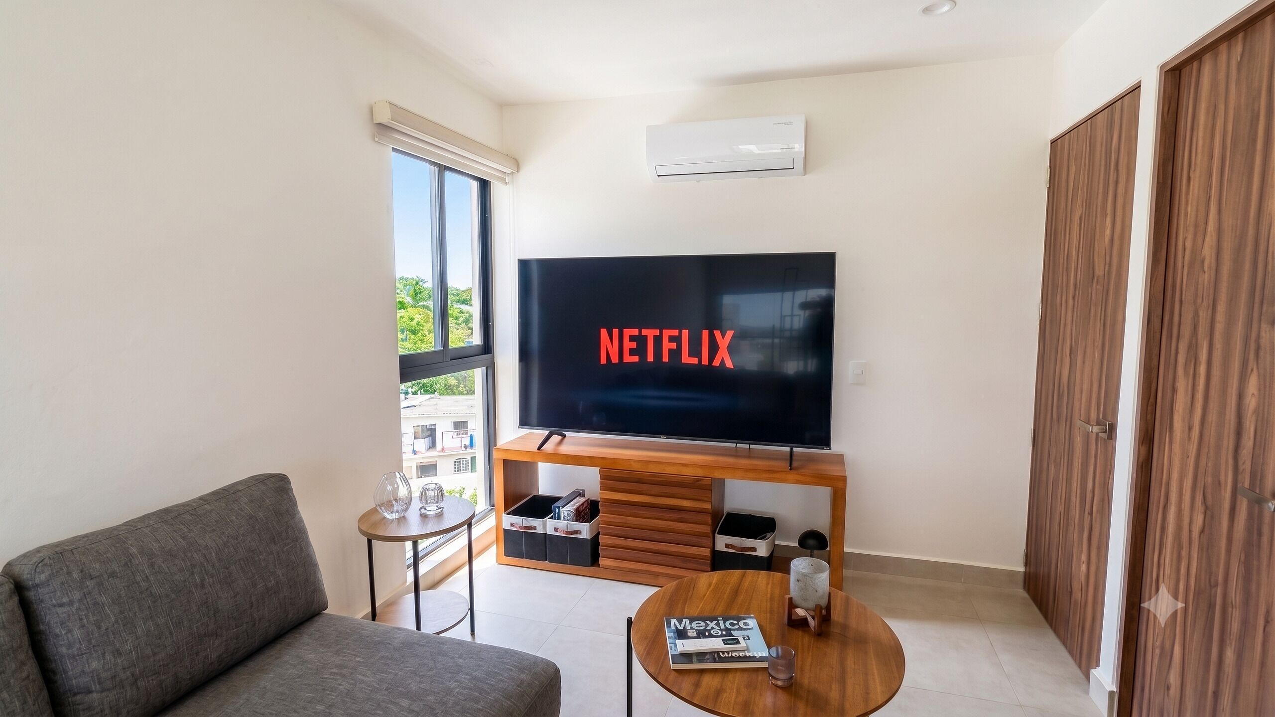 Luxury Apartment | Living area | 60-inch LED TV with cable channels